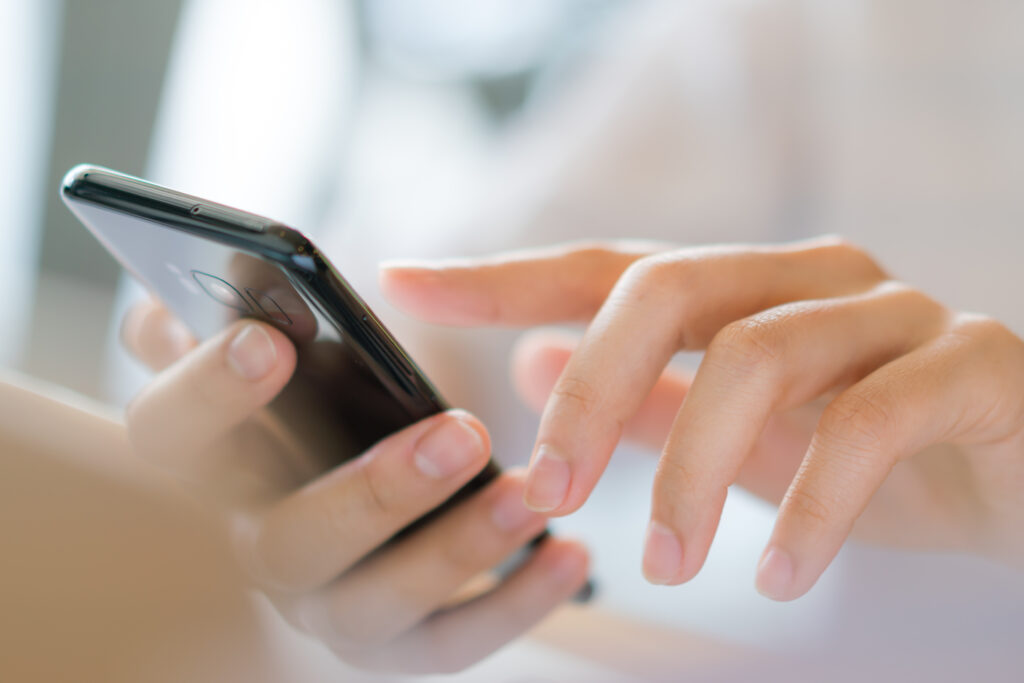 business hand with mobile phone